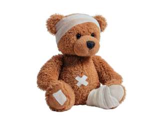Cute brown teddy bear with medical bandages on head and leg isolated on transparent background, soft plush toy symbolizing healing, recovery, care, hospital, and children’s health concept