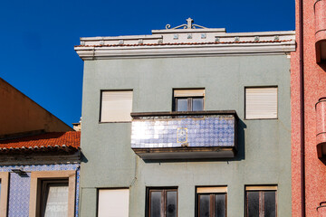 Traditional Portuguese building facade with blue tiled balcony, Portugal, Ovar, 8.10.2025