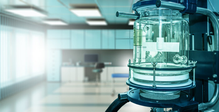 Bioreactor equipment in modern laboratory used for chemical synthesis and biological research. Biotechnology, pharmaceutical production and scientific innovation.