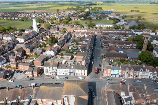 Aerial drone photo of the town of Withernsea in Holderness, East Riding of Yorkshire, England showing the British seaside town with a view of the housing estates and streets on a sunny summers day