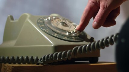 Making a call on vintage rotary dial phone  - Powered by Adobe