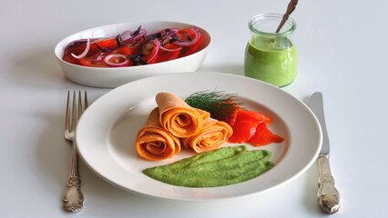 Tomato crepes folded into a rose