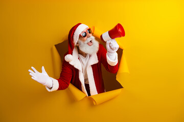 Funky Santa Claus uses a red megaphone against a yellow backdrop, showcasing holiday cheer and festive spirit