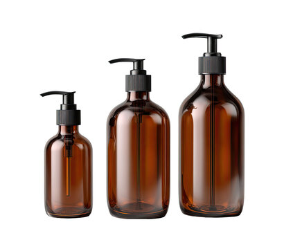 Three amber glass bottles with black pump dispensers of varying sizes, arranged from smallest to largest