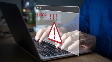 System Error Warning on Laptop: Man Typing with Virtual Popup for Computer Problem or Technical Failure