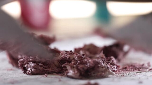  preparing and mixing ice cream with spatula. Mixing different flavour ice creams with knife.
