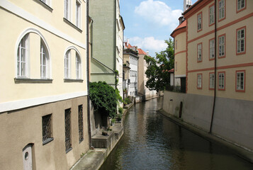 The Čertovka river between houses in Prague