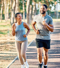 Naklejka premium Couple jogging and running in a park healthy lifestyle