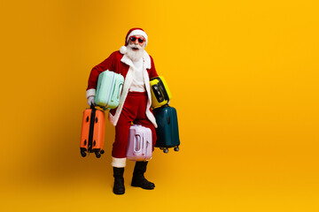Santa Claus carrying colorful luggage against yellow backdrop celebrating holiday spirit with joy and charisma