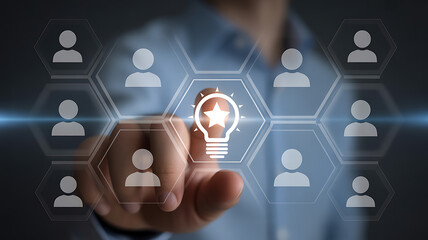 Businessman touching a light bulb icon on a virtual screen, representing a new idea, innovation, creativity, and teamwork in a modern business environment