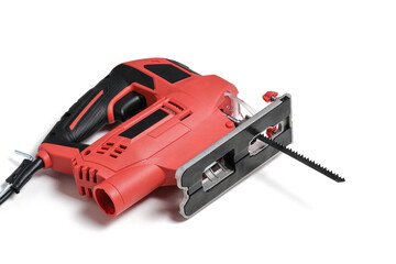Red electric jigsaw on white background.