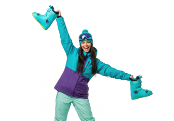 A woman in ski gear holding ski boots, isolated on transparent background