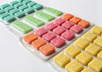 multi-colored chewable tablets, medicines, vitamins