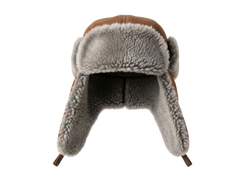 Brown and grey fur trapper hat with ear flaps isolated on transparent background