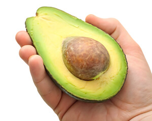 Ripe avocado half with seed held in hand isolated on a transparent background image