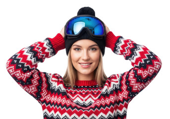 Fototapeta premium Young woman wearing a red and white patterned sweater and ski goggles, smiling and holding goggles on her head, isolated on transparent background