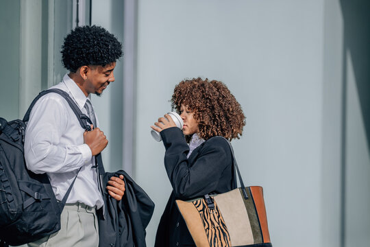 business people drinking coffee during a break