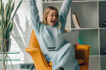 young woman or student at home with laptop, successful