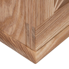 Close up view of a rustic wooden surface with visible grain patterns and a beveled edge detail
