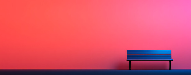 A minimal art piece showcases a lone blue bench against a striking gradient pink backdrop, embodying simplicity, solitude, and the allure of a colorful, quiet moment.