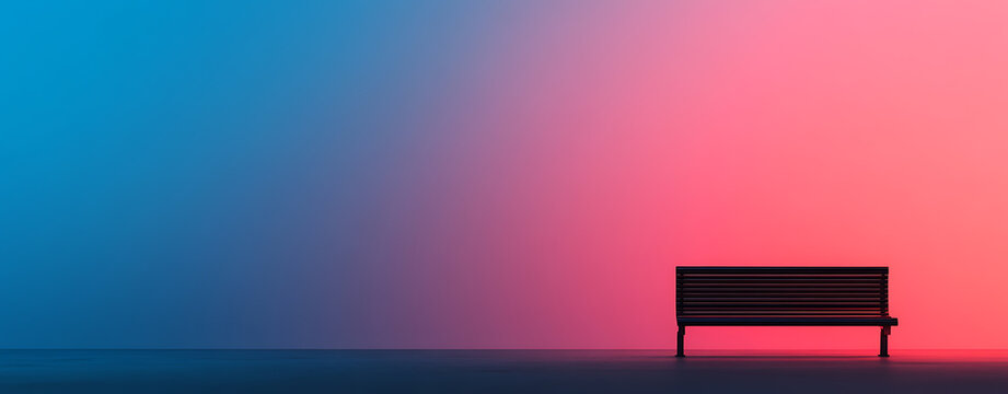 A bench rests against a vibrant backdrop of blue and pink, the light creating a gradient effect. It is simple, yet eye-catching. A calming scene in a studio.