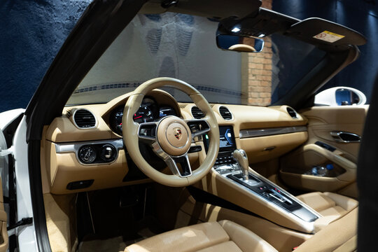 Porsche 718 Boxster S interior cockpit, Tan leather seats, luxury roadster