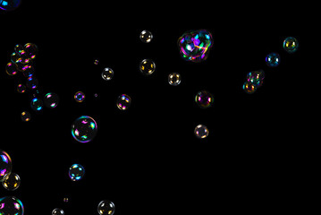 Soap bubbles isolated on a black background.