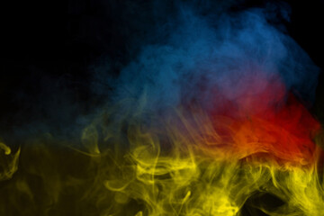 Purple and blue steam on a black background.