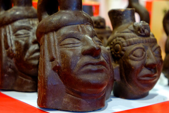 Paris, France, Europe. Ancient Mayan figure heads in chocolate
