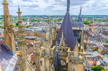 Aerial view from top of Amiens Cathedral with fleche spire and panorama of Amiens old historical city centre and outskirts districts, Somme department, Hauts-de-France Region, Northern France