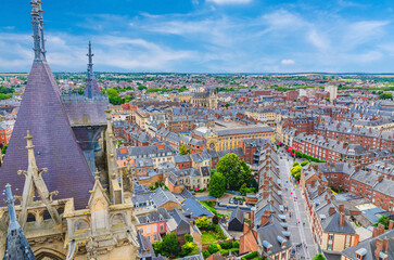 Aerial view from top of Amiens Cathedral with fleche spire and panorama of Amiens old historical city centre and outskirts districts, Somme department, Hauts-de-France Region, Northern France