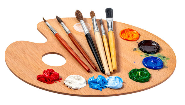 Artistic wooden palette with an assortment of colorful paints and brushes