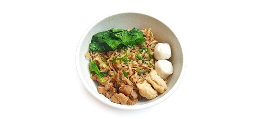 Mie Ayam Indonesian Chicken Noodle Soup with Fish Balls in a Bowl Isolated on White Background. Food Photography