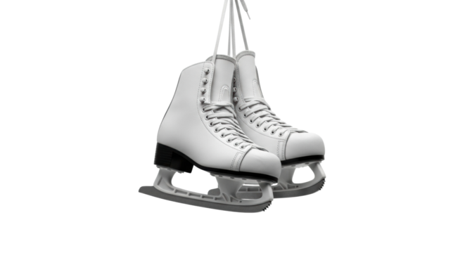 White ice skates hanging by laces in mid-air
