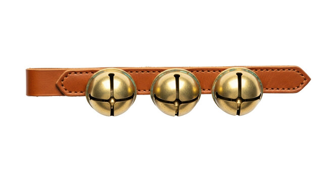 Three golden sleigh bells on brown leather strap against black background