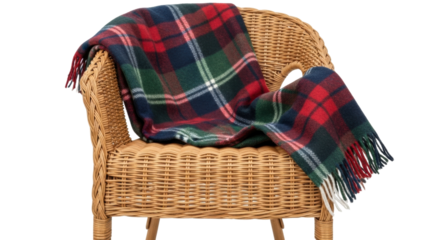 Cozy tartan blanket on woven rattan chair
