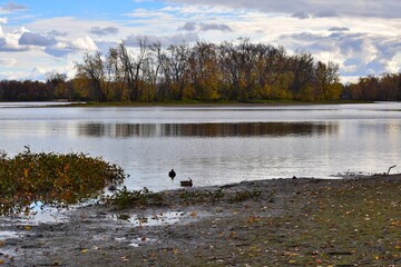 A beautiful autumn landscape on a river shore in Laval, Quebec, Canada
