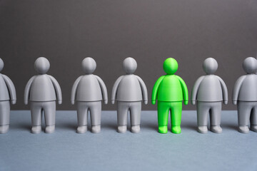 A green man among grays. A talented person. The best of the candidates. Individuality, creativity,...