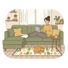woman sitting on sofa with laptop