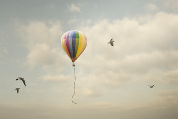 Hot air balloon flies free in the sky, concept of freedom and fantasy