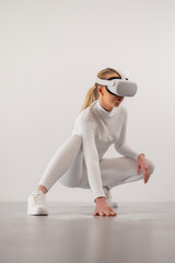 Woman Squatting with Virtual Reality Device