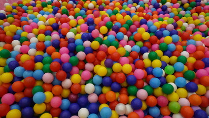 Colorful Plastic Balls in Bright Playroom Area