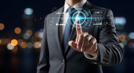 Man in suit initiates dynamic digital interface with glowing play button and data charts