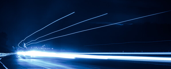 blue car lights at night. long exposure