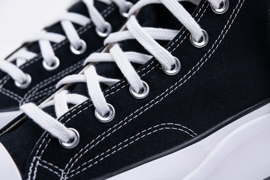 close-up of the lacing of the fashion brand's modern casual sneakers - Powered by Adobe