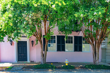 Architecture of Charleston in South Carolina. Old houses in pastel colors.