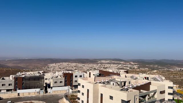 Gush Etzion, Israel. 31 October 2025, Panoramic view from Mitzpor HaElef lookout, overlooking kibbutzim, surrounding villages, and the wide expanse of the Judean Desert fading into the horizon.