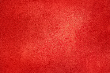 Fototapeta premium The background is red with a light center, suede leather.