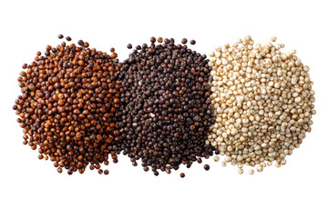 Three piles of various quinoa