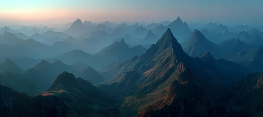 Serene mountain landscape at sunrise with misty blue and pink tones